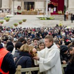 Priests giving Communion